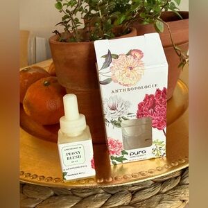 USED. 3/4 left. PLEASE BUY. I HATE IT Pura Anthropologie Peony Blush Oil Refill